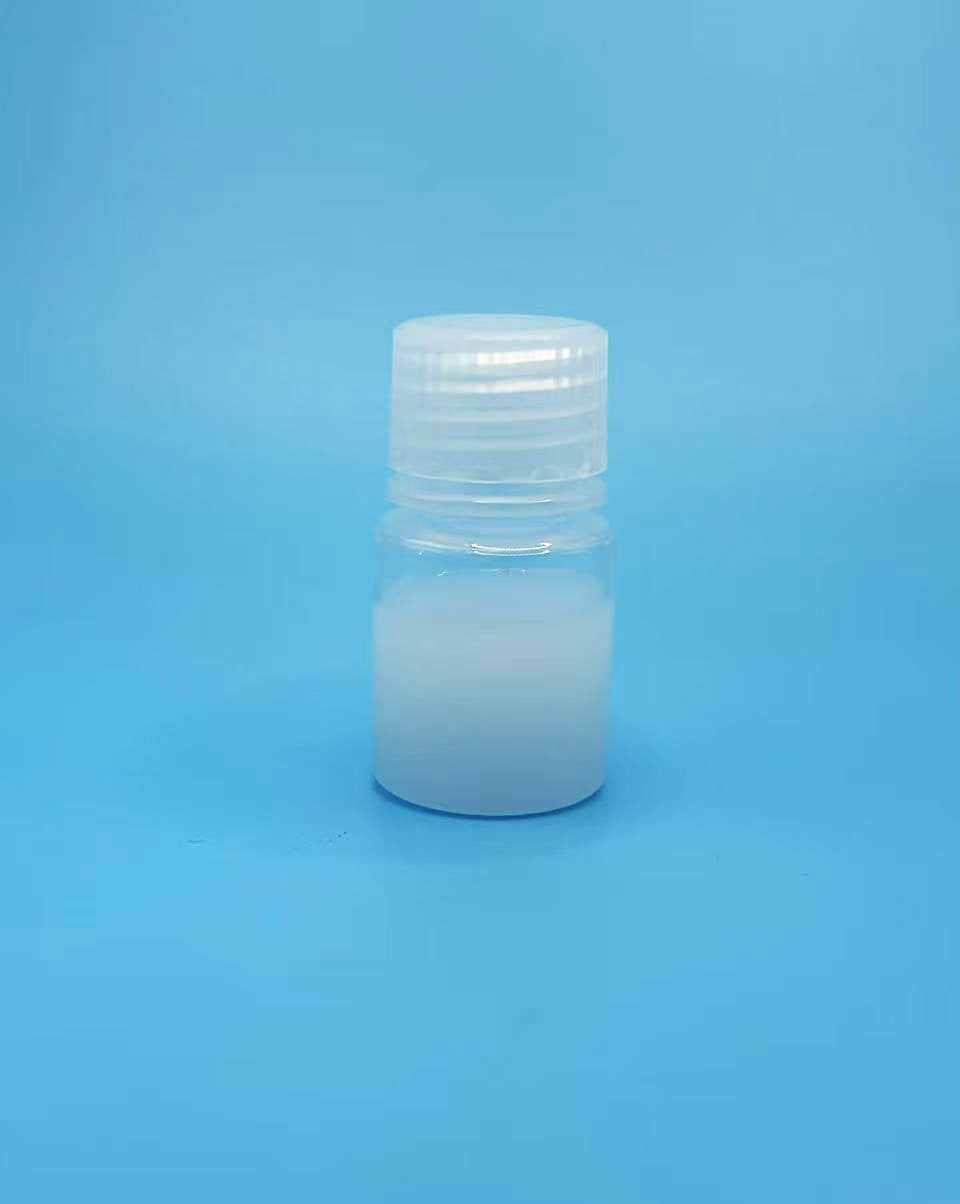 Small white bottle with a screw cap on a blue background